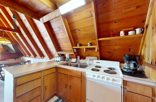 Williamsburg House | Rustic A-Frame Retreat on Grand Traverse Bay w/beach, wifi, fire pit & grill