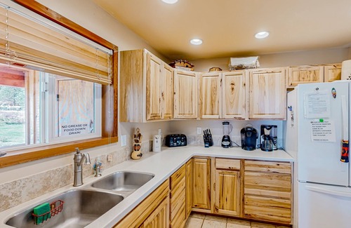 Garden Valley Cabin | Rustic and secluded cabin with two decks, hot tub, board games, W/D, & AC