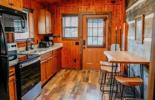 Gatlinburg Cabin | Rustic cabin with modern amenities, On the water, 0.4 miles to Downtown!