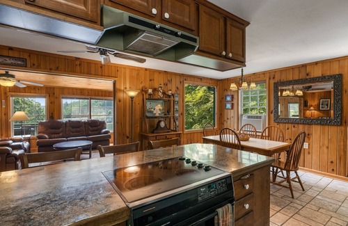 Sunset Cove Cottage | Rustic Cozy Cabin Lakefront Water Trampoline