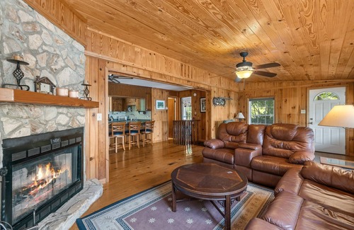 Sunset Cove Cottage | Rustic Cozy Cabin Lakefront Water Trampoline