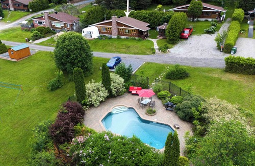Nominingue Ski Chalet | Rustic experience with heated pool and spa