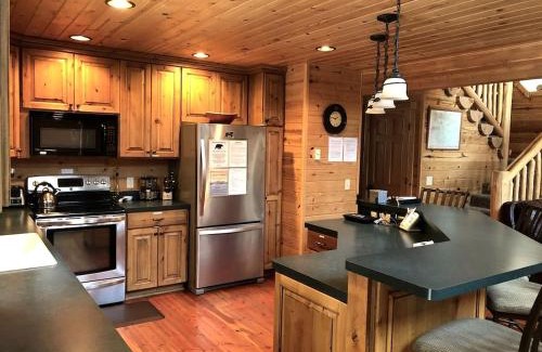 Island Park House | Rustic Family Cabin Nestled Among the Towering Trees in Idaho