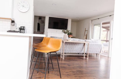 Tomahawk House | Rustic Lake Nokomis Cabin with Hot Tub, Trails, and Family Fun for 10!