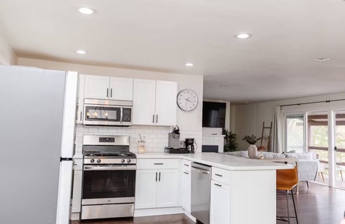 Tomahawk House | Rustic Lake Nokomis Cabin with Hot Tub, Trails, and Family Fun for 10!