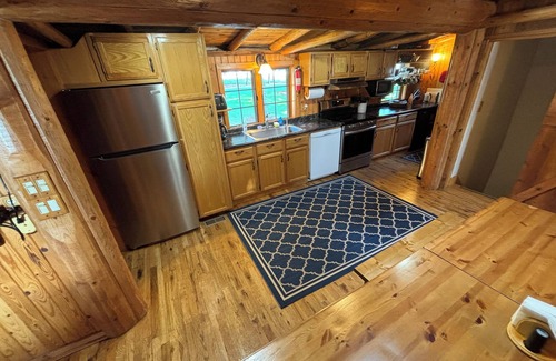 Cheboygan Cabin | Rustic Log Cabin -Water Front, Boating, Fishing, Air conditioned!