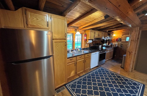 Cheboygan Cabin | Rustic Log Cabin -Water Front, Boating, Fishing, Air conditioned!