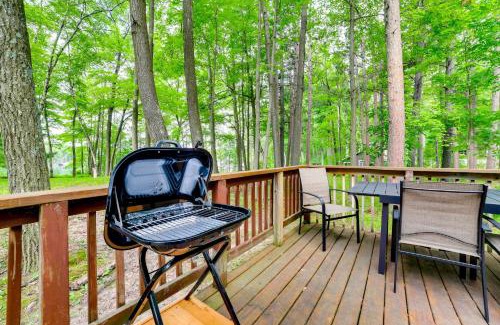 Rose City House | Rustic Michigan Lakeside Cabin with Private Dock!