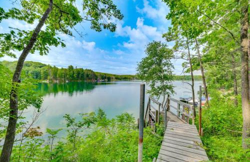 Rose City House | Rustic Michigan Lakeside Cabin with Private Dock!