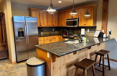 Kellogg Condo | Rustic Penthouse Condo with Large Community Spa Room.