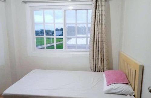 San Fernando House | Rustic Retreat room in San Fernando La Union