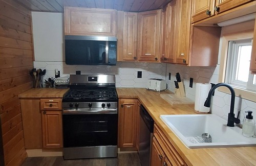 Maple View House | Rustic Riverside Charm and Exclusive Fishing Access!
