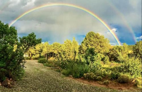 Zuzax House | Rustic Tree House Rental with a Fire Pit in Bernalillo County, New Mexico