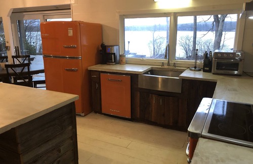 Swanton House | Rustic, yet Upgraded Cabin on Stunning, Level Lakefront Lot with LONG Lake Views