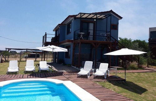 Sauce de Portezuelo Apartment | Sándalo en Aroma de Mar: Vive el mar en esta hermosa casa con piscina.