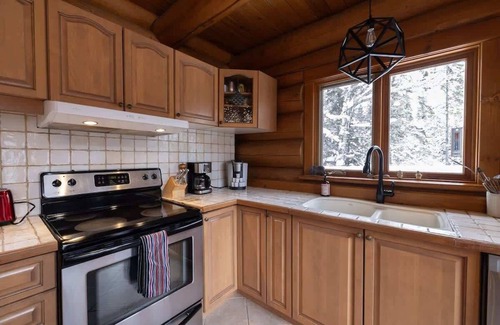 Mont-Tremblant Ski Chalet | Sainte-Lucie: Luxury Chalet with Hot Tub, River & Sauna!