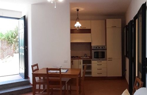 La Caletta Apartment | Sa Calitta apartment, central area with large veranda 300 mt from the beach