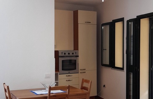 La Caletta Apartment | Sa Calitta apartment, central area with large veranda 300 mt from the beach