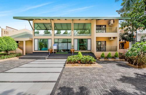Nashik Villa | SaffronStays Amaltas, Nashik - pool villa with huge lawns perfect for large groups and corporate offsites