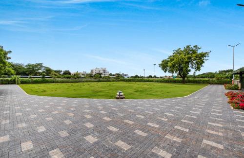 Nashik Villa | SaffronStays Amaltas, Nashik - pool villa with huge lawns perfect for large groups and corporate offsites