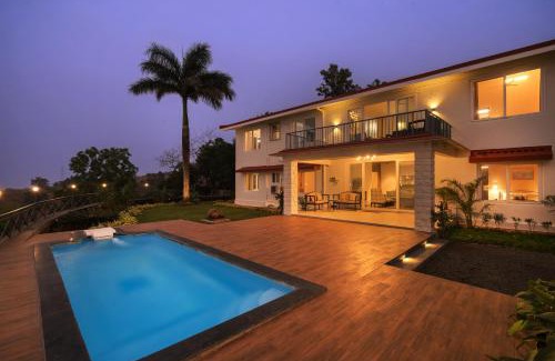 Thakursai Villa | SaffronStays Blue Infinitum Lakeview, Pawna