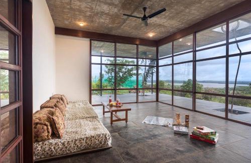 Igatpuri Villa | SaffronStays Zen, Igatpuri - lake-view villa with indoor and outdoor games