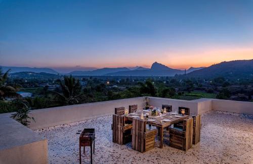 Kadadhe Villa | SaffronStays Zuma Villa, Pawna - luxury villa with a heated pool, sports court and gym