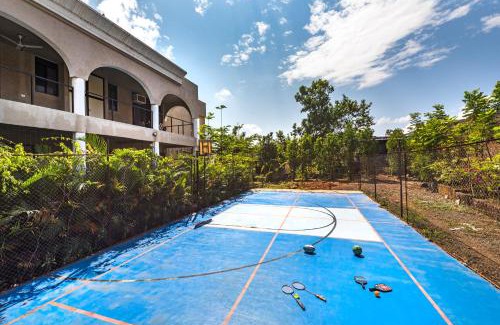Kadadhe Villa | SaffronStays Zuma Villa, Pawna - luxury villa with a heated pool, sports court and gym