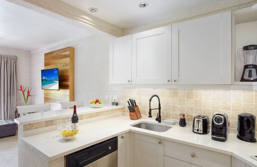 Merlin Bay Apartment | Sago is located on the exclusive Royal Westmoreland Golf Resort