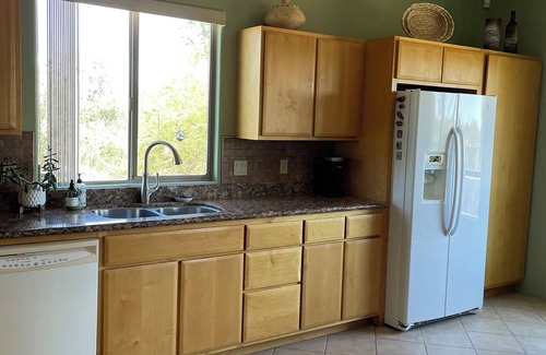 Tucson House | Saguaro Studded City and Mountain Views in the Tucson Mountain foothills.