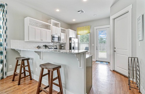 Sailhouse House | Sailhouse home with private beach, fishing pier, covered decks, & shared pool