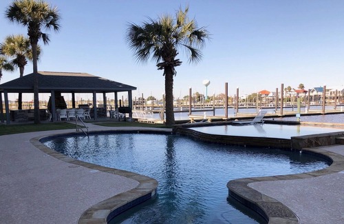 Port Arthur Condo | SALT LIFE Waterfront on Sabine Lake With Pool