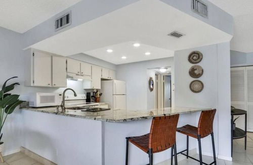 Jupiter One Apartment | Saltwater Sanctuary Coastal Retreat Steps to Shore