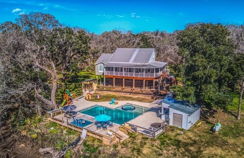 Cedar Lane House | San Bernard: Enjoy a Spa, Your Own Private Boat Ramp, and Jet-Skiing