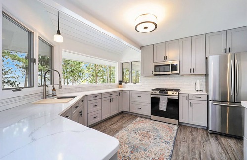 Higgins Lake House | Sand beach at your doorstep