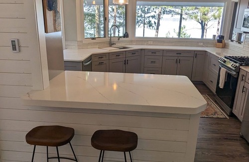 Higgins Lake House | Sand beach at your doorstep