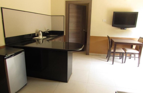 Vainguinim Hotel | Sandalwood Hotel & Suites