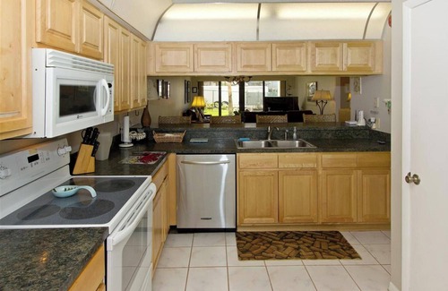 Cocoa Beach Condo | Sandcastles 113 is just steps to the pool and the beach