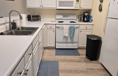 Sunset Beach Condo | Sandpiper Bay golf course. 3 bdrm condo on golf course with pool & tennis court.