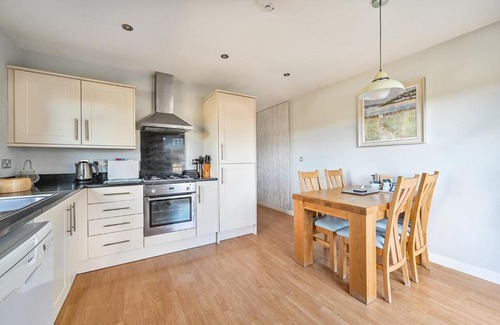 Winnard's Perch House | SandPipers Luxury hot tub lodge with 2 ensuites a private Sauna & BBQ terrace