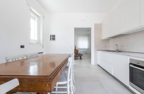 Torre Grande Apartment | Sandy Retreat