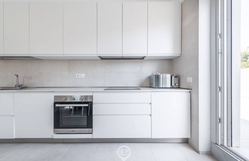 Torre Grande Apartment | Sandy Retreat
