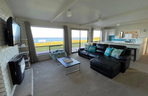 Sisters Beach House | Sandy Shores on Irby - Beach frontage at beautiful Sisters Beach