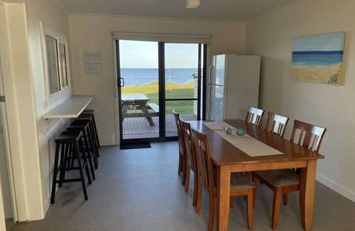 Sisters Beach House | Sandy Shores on Irby - Beach frontage at beautiful Sisters Beach