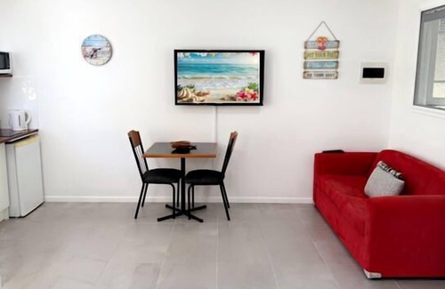 Toogoom Cabin | Sandy Toes Beachside Pad-Walkway to Toogoom Beach-Sleeps 4-BBQ-Plunge Pool