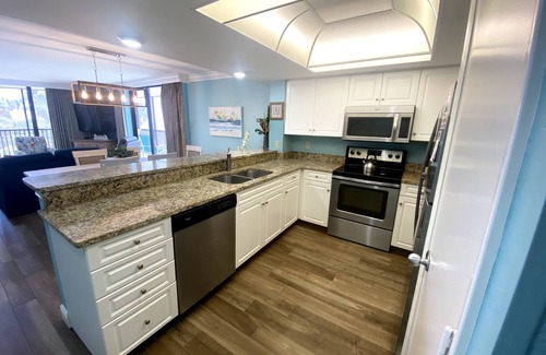 Punta Rassa Condo | Sanibel Harbour Resort: Bay View Tower 231: Beachfront Condo with pool and water views