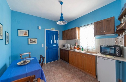 Megalochori Apartment | Santorious Flower Covered Apartment