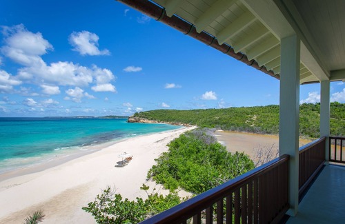 Long Bay Village House | Santosha Estate in Long Bay by Personal Villas - Winding Oceanfront Pool