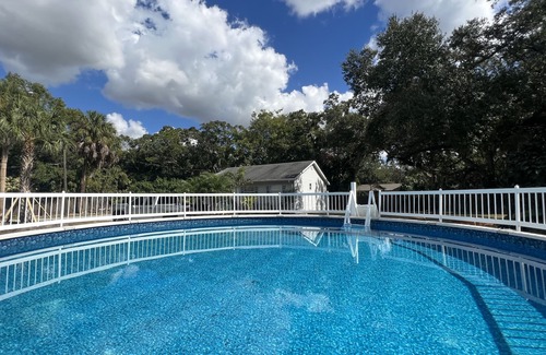 Bayou Oaks House | Sarasota Beach House themed designer cottage- sleeps 6 - pool- tropical oasis.