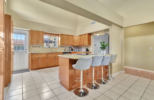 Lake Worth House | Sauna Beach House with a Salt Water Heated Pool